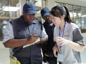 Trainees work with interpreters while in China