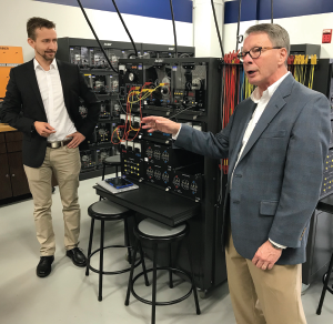 Dr. Alex Lemken, ioxp GmbH co-founder (left), and Philip Riddle, SeeDaten president and CEO (right), present new state-of-the art technology at SCC